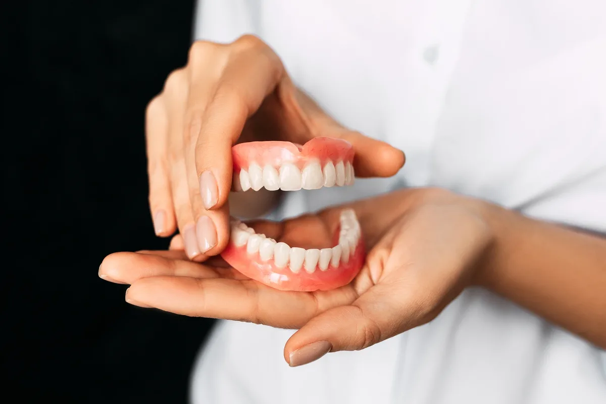 What Are Dentures? Types, Care & Benefits