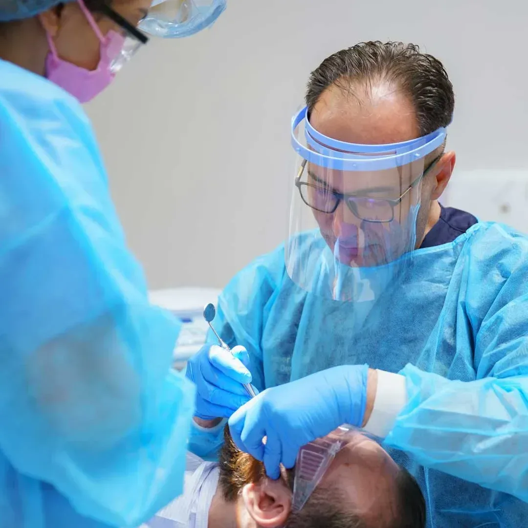 A Harmony dentist providing a caring checkup for a patient seeking a second opinion.
